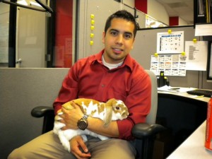 Product Manager Jesus Sanchez takes a break to meet System ID's Easter bunny, Ginger.