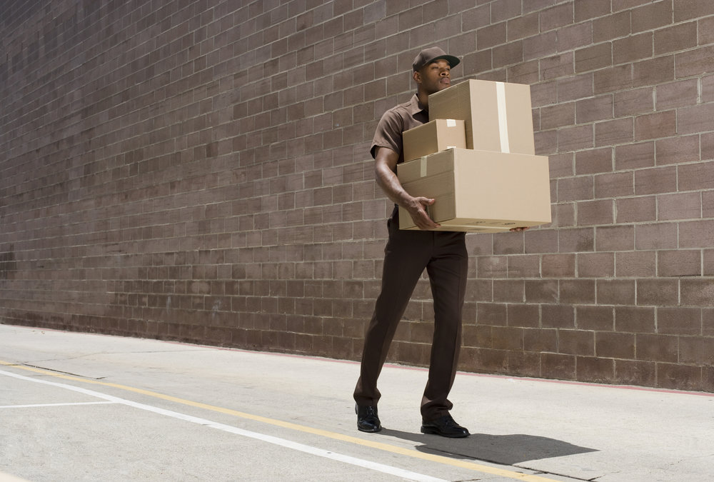 delivery-person carrying boxes