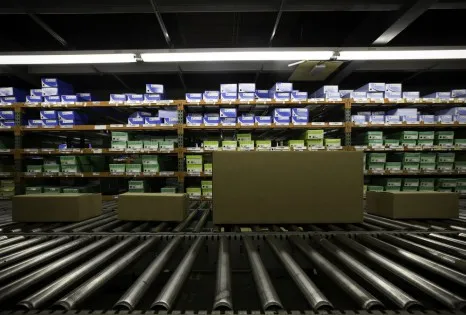 Boxes in a warehouse on rollers.