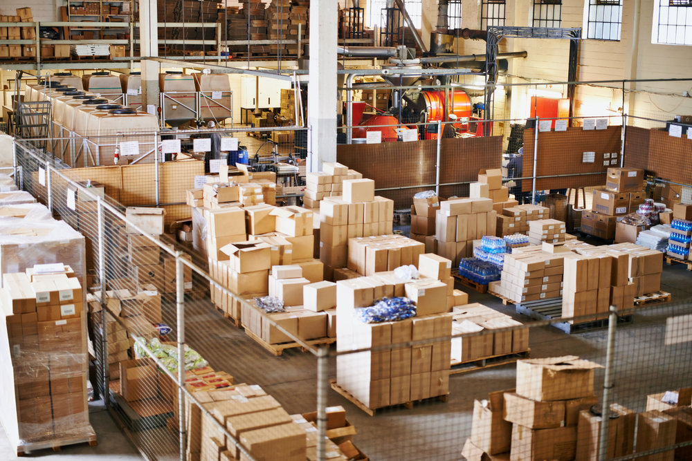 Shot of the interior of a large packaging and distribution warehouse