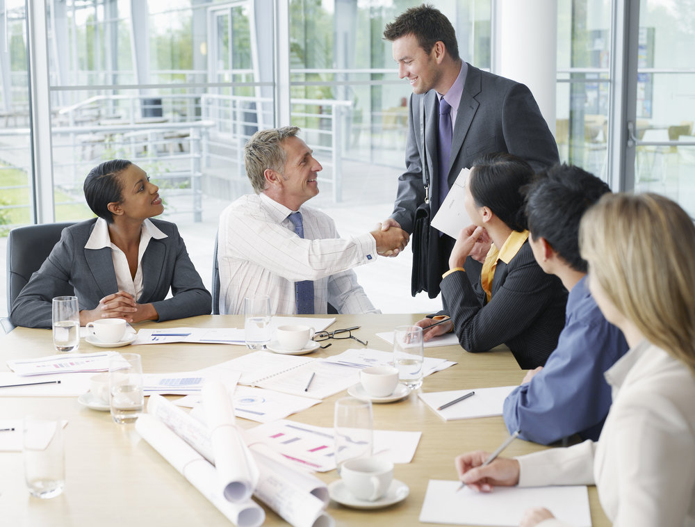 Businesspeople having meeting in conference room