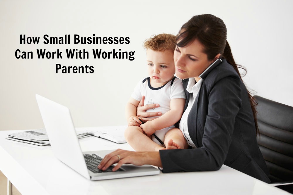 Working mom talking on the phone while holding a baby and typing on her laptop